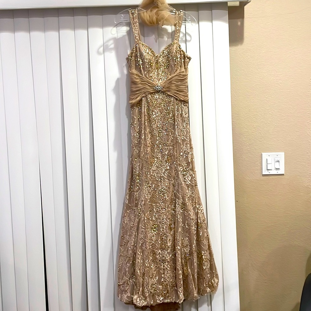 Cream/Gold colored Couture Dress extremely beaded. Size 10 but runs small